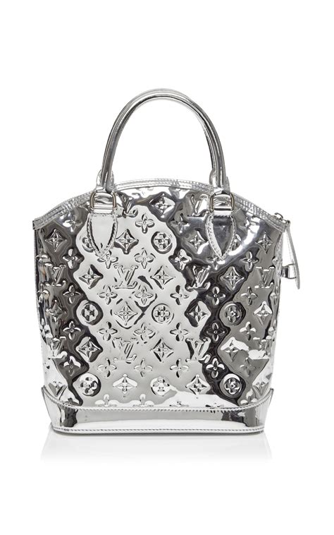 silver metallic louis vuitton bag|louis vuitton cylinder bag.